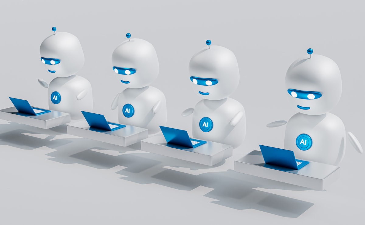 AI robots using laptops, representing artificial intelligence tools for nursing education and professional practice.